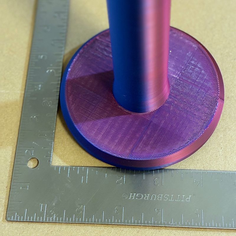 Minimalist 3D-printed paper towel holder on a kitchen counter