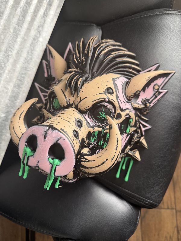 Multi-color 3D-printed punk warthog head wall art with green slime